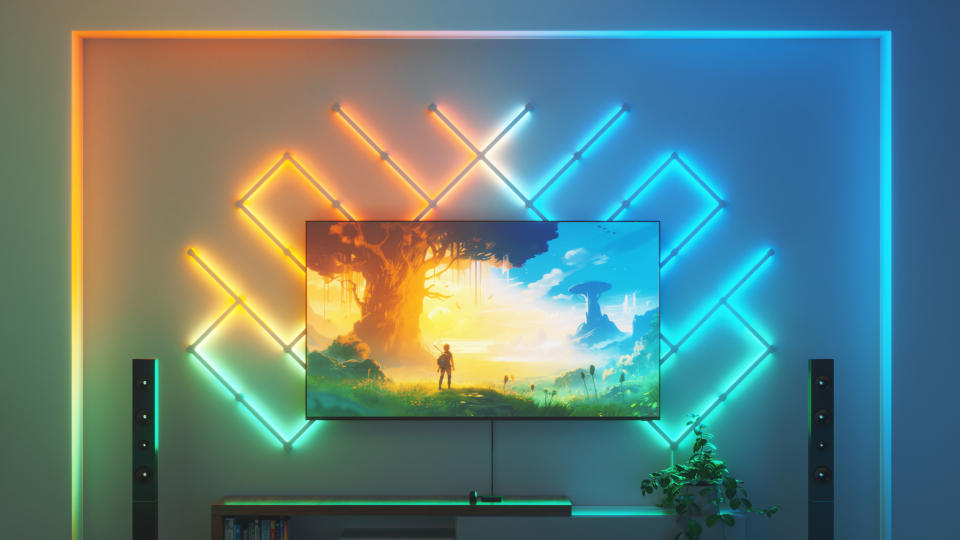  A TV in a living room surrounded by bright Nanoleaf light panels 