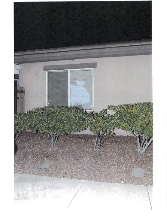 <em>Damage to a window police say Weaver vandalized during his attempt to speak with Gov. Joe Lombardo and his family. (KLAS)</em>