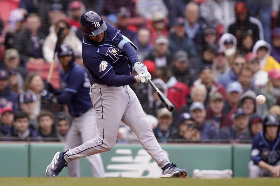 Tampa Bay Rays' Manuel Margot singles to left field allowing two runners to score on a fielding error in the fourth inning of a baseball game against the Boston Red Sox, Sunday, June 4, 2023, in Boston. (AP Photo/Steven Senne)