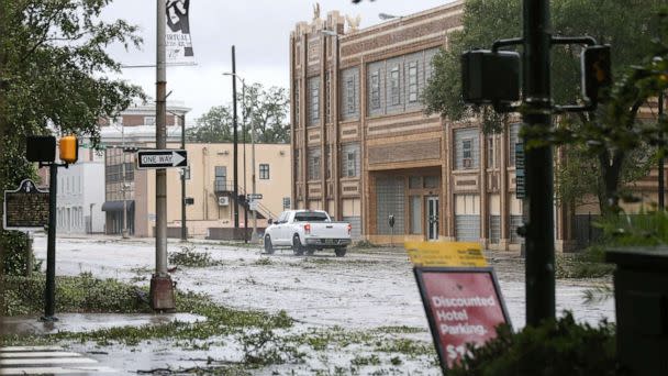 PHOTO:A car drives down Government Street during Hurricane Sally in Mobile, Ala., Sept. 16, 2020. (Jonathan Bachman/Reuters)