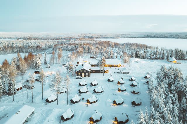 <p>Courtesy of Apukka Resort</p> Glass igloos dot the grounds of the Apukka Resort.