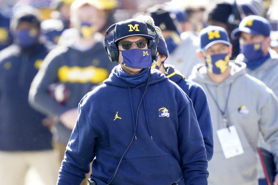 Michigan head coach Jim Harbaugh is seen during the first half of an NCAA college football game, Saturday, Oct. 31, 2020, in Ann Arbor, Mich. (AP Photo/Carlos Osorio)