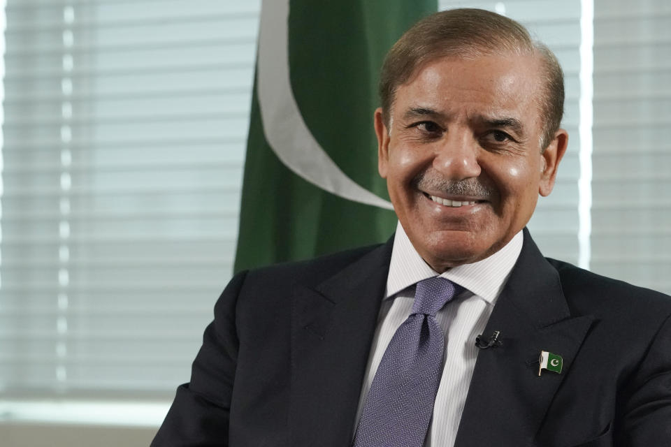 Prime Minister of Pakistan Shehbaz Sharif smiles during an interview with The Associated Press, Thursday, Sept. 22, 2022, at United Nations headquarters. Sharif said he came to the United Nations to tell the world that his country is the victim of unprecedented climate change-induced flooding that has submerged one-third of its territory and left 33 million people scrambling to survive, and to warn that “tomorrow this tragedy can fall on some other country.” (AP Photo/Mary Altaffer)