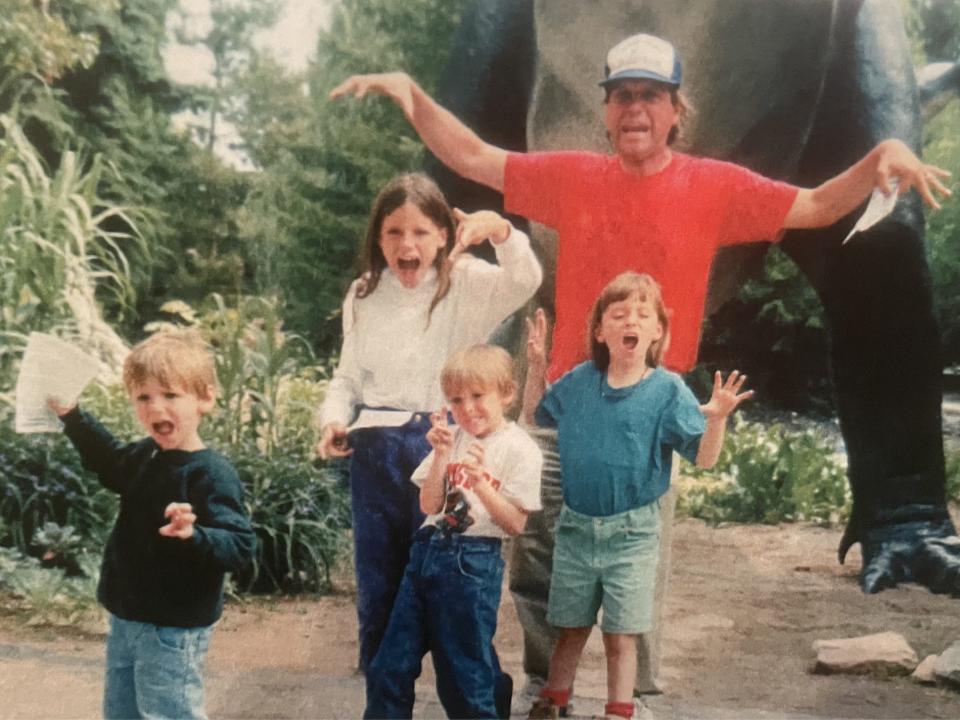 An old picture of the writer's family at a dinosaur exhibit in Utah