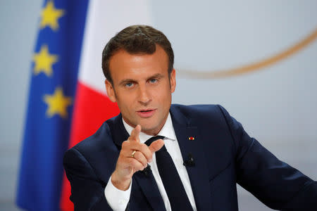 French President Emmanuel Macron speaks during a news conference to unveil his policy response to the yellow vests protest, at the Elysee Palace in Paris, France, April 25, 2019. REUTERS/Philippe Wojazer