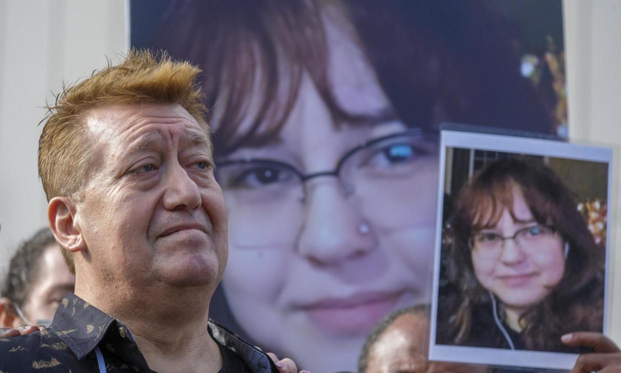 <span>Juan Pablo Orellana Larenas, father of Valentina Orellana-Peralta, holds a photo of his daughter during a news conference in 2021. </span><span>Photograph: Ringo HW Chiu/AP</span>