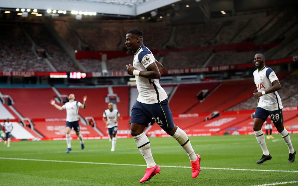 Tottenham's Serge Aurier, center, celebrates after scoring his side's fifth goal during the English Premier League soccer match between Manchester United and Tottenham - REUTERS