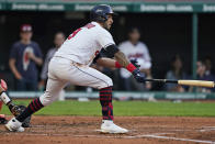 Cleveland Indians' Eddie Rosario watches his RBI double in the third inning of the team's baseball game against the Baltimore Orioles, Wednesday, June 16, 2021, in Cleveland. (AP Photo/Tony Dejak)