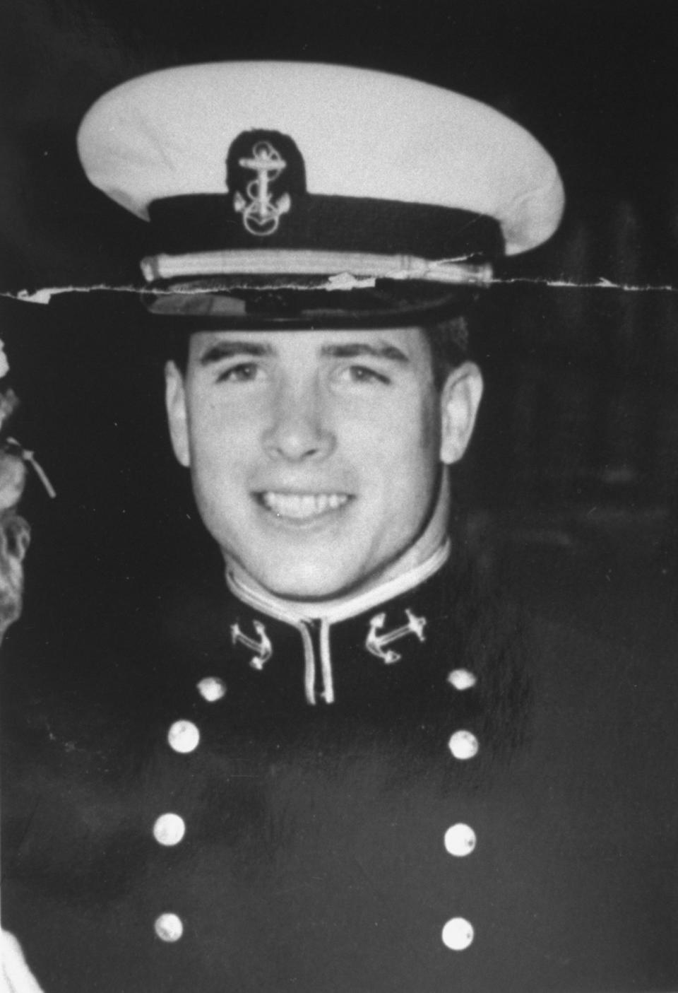 This reproduction of a family photo shows McCain in military uniform at his sister Sandy's wedding in the late 1950s.