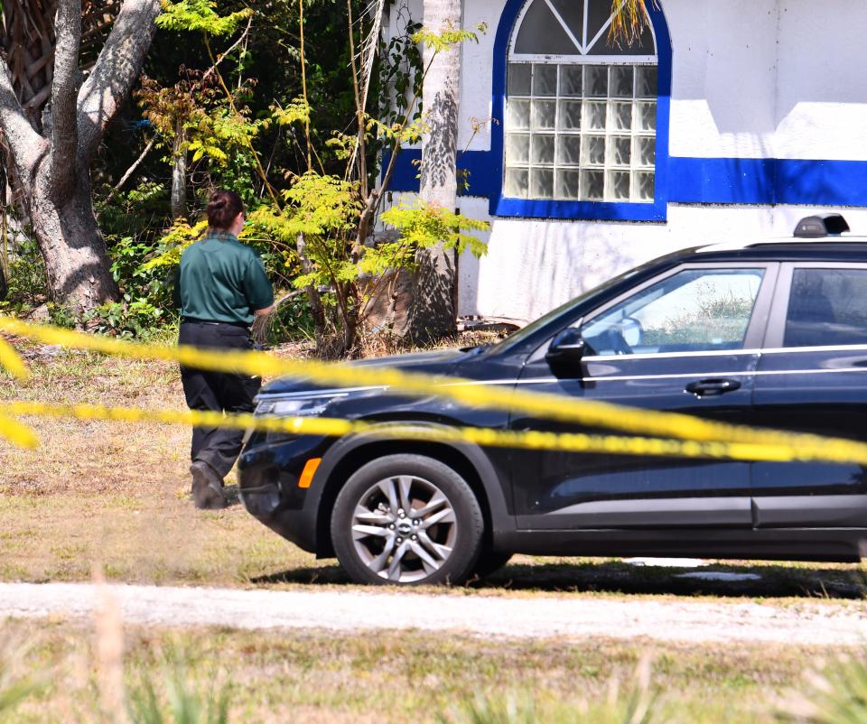 Heavy police presence on scene at 4075 Alan Shepard Ave. In Canaveral Groves, investigating four homicides.