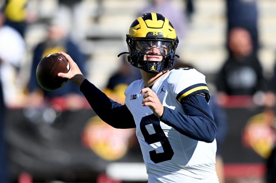 Michigan quarterback J.J. McCarthy warms up before the game against Maryland at SECU Stadium on Nov. 18, 2023 in College Park, Maryland.