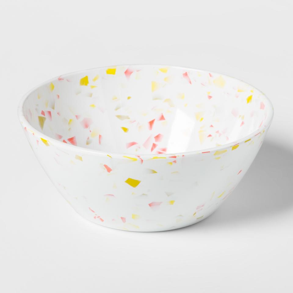 Because terrazzo floors probably aren't in the cards. <a rel="nofollow noopener" href="https://www.target.com/p/terrazzo-round-plastic-cereal-bowl-6-3-pink-yellow-room-essentials-153/-/A-53129773" target="_blank" data-ylk="slk:SHOP NOW;elm:context_link;itc:0;sec:content-canvas" class="link ">SHOP NOW</a>: Room Essentials Terrazzo Round Plastic Cereal Bowl in Pink/Yellow, $2 each