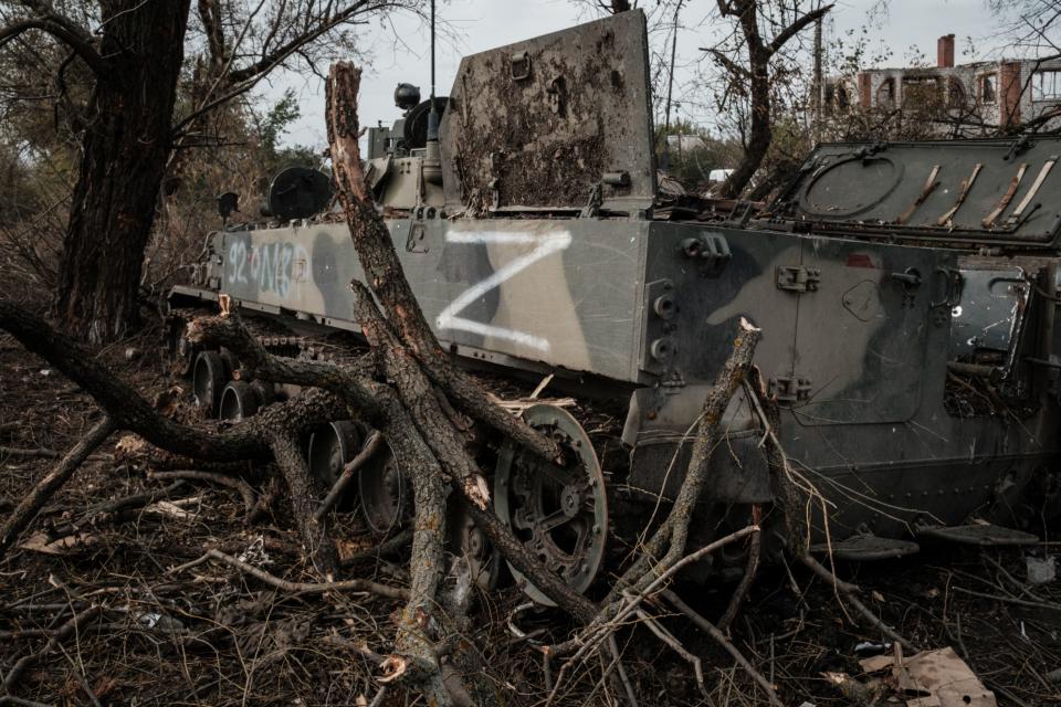 This photograph taken on September 30, 2022 shows abandoned Russian armoured personnel carrier (APC) marked Z in Kyrylivka, in the recently retaken area near Kharkiv. (Photo by Yasuyoshi CHIBA / AFP) (Photo by YASUYOSHI CHIBA/AFP via Getty Images)