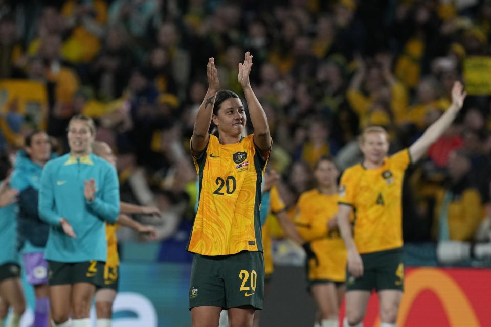 Australia's Sam Kerr applauds after the Women's World Cup round of 16 soccer match between Australia and Denmark at Stadium Australia in Sydney, Australia, Monday, Aug. 7, 2023. Australia won 2-0. (AP Photo/Mark Baker)