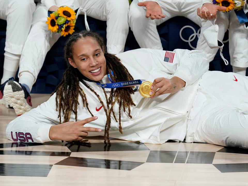 United States's Brittney Griner (15) poses with her gold medal during the medal ceremony for women's basketball at the 2020 Summer Olympics, Sunday, Aug. 8, 2021, in Saitama, Japan.