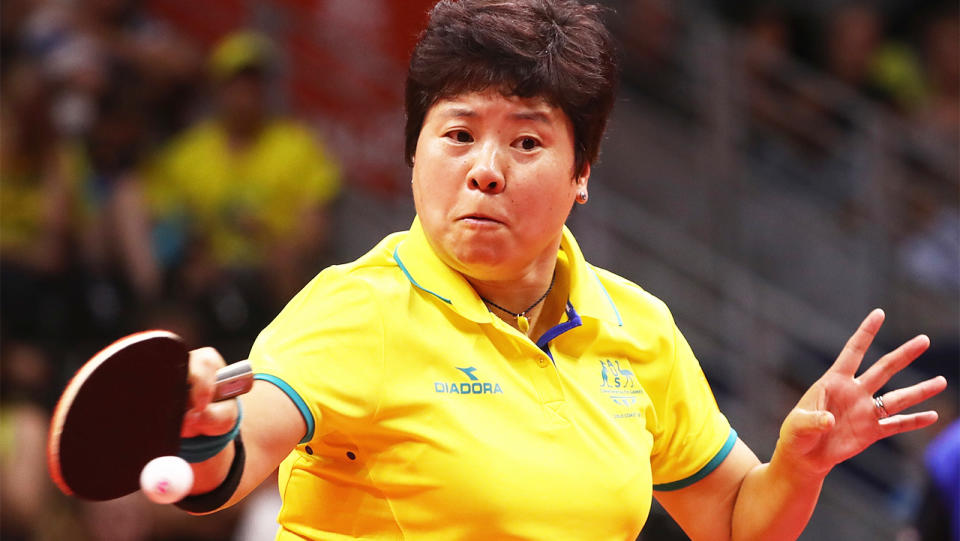 Olympian Jian Fang Lay (pictured) hits the table tennis ball.