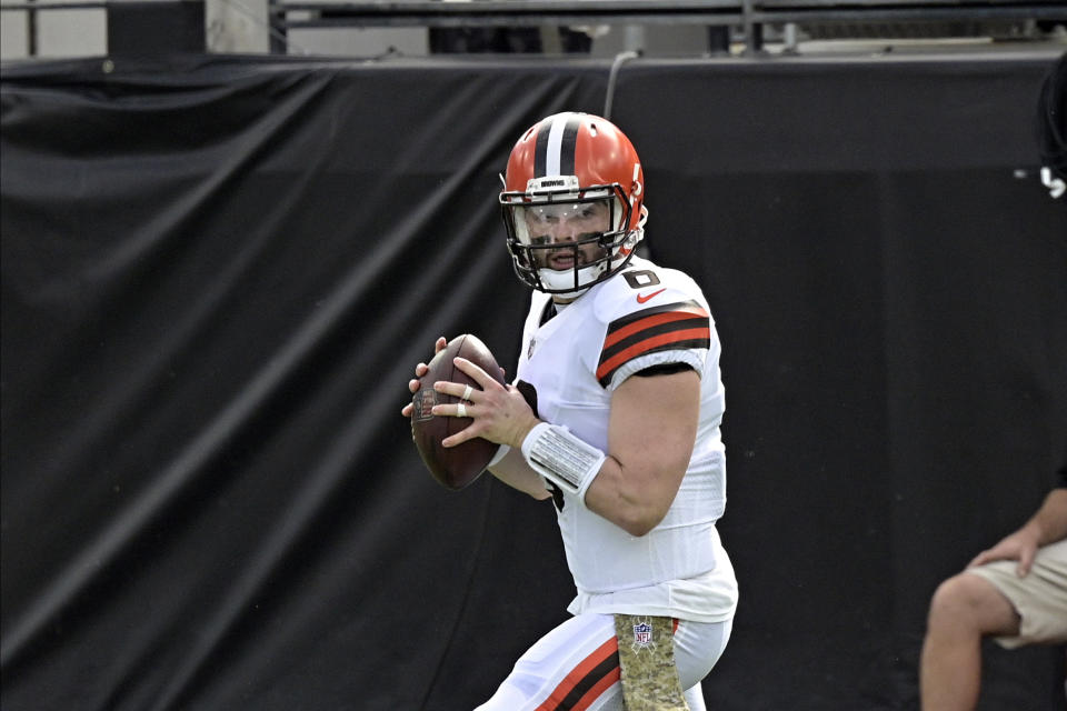 Cleveland Browns quarterback Baker Mayfield looks for a receiver against the Jacksonville Jaguars during the first half of an NFL football game, Sunday, Nov. 29, 2020, in Jacksonville, Fla. (AP Photo/Phelan M. Ebenhack)