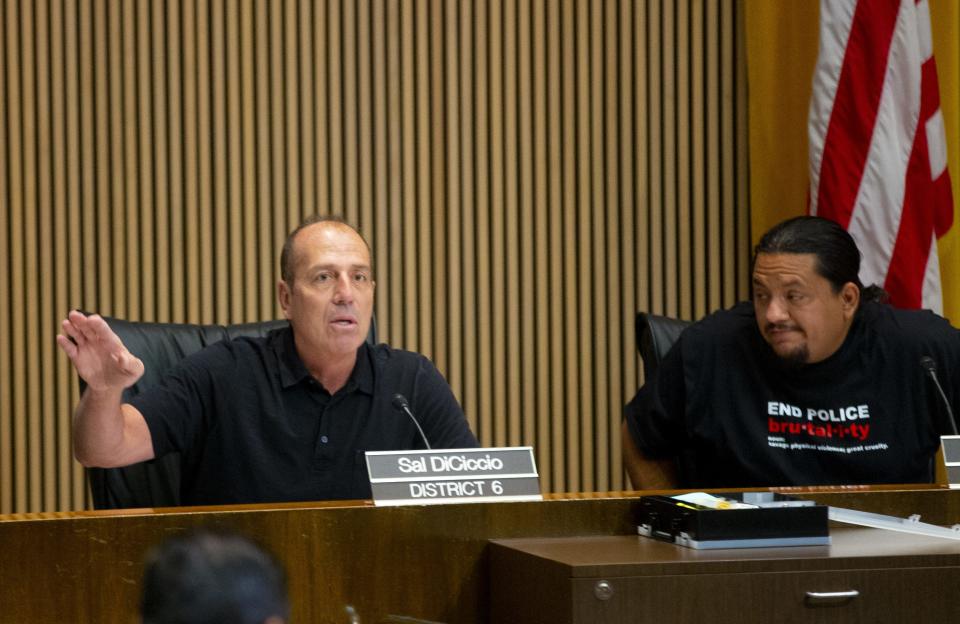 Phoenix Councilman Sal DiCiccio (left), pictured in 2019, has all but formally said he won't run for county supervisor.