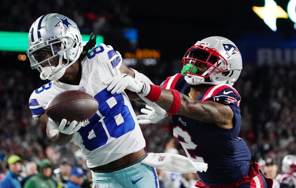 Cowboys WR CeeDee Lamb scores the winning touchdown in overtime against the Patriots.