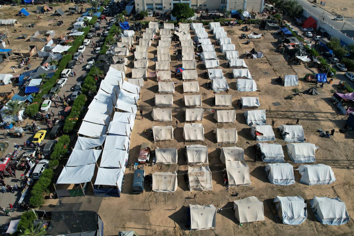 Palestinians in UN tents in Khan Yunis, where millions have fled to from the north of Gaza (Copyright 2023 The Associated Press. All rights reserved.)