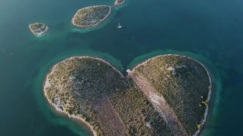 The Teatime sailing boat is seen near the Heart Island