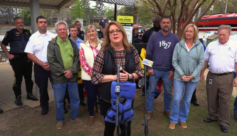 Pam Fair, executive director of Safe Kids Columbus, center, said seven life jacket loaner stations are opening March 26 around the Chattahoochee Valley where people may borrow the life jackets at no cost, and then return them at the end of the day.