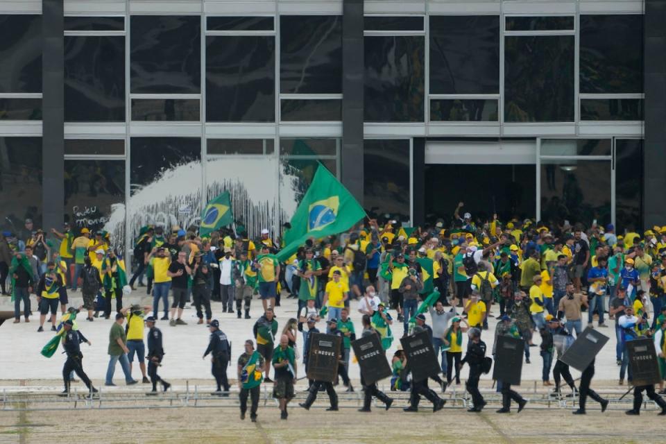 Protesters, supporters of Brazil’s former President Jair Bolsonaro, storm the Supreme Court building in Brasili (Copyright 2023 The Associated Press. All rights reserved)