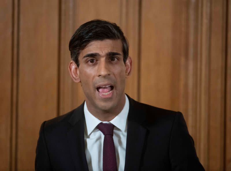 FILE PHOTO: British PM Johnson holds a news conference with Chancellor of the Exchequer Rishi Sunak and Deputy Chief Medical Officer Dr Jenny Harries on coronavirus in London