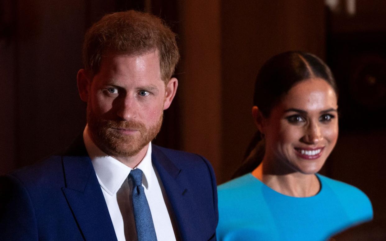 Can the Duke and Duchess of Sussex square their advocacy work with another Spotify podcaster's anti-vaccination comments? - JUSTIN TALLIS/AFP/Getty