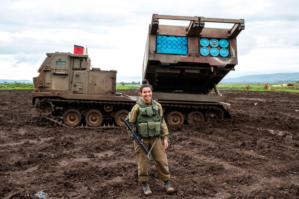 <p>Israeli army sergeant Amit Malekin, 19, commander of a mobile rocket launcher, poses for a picture in the Israeli-annexed Golan Heights near the border between Israel and Syria on February 26, 2018. (Photo: Jack Guez/AFP/Getty Images) </p>