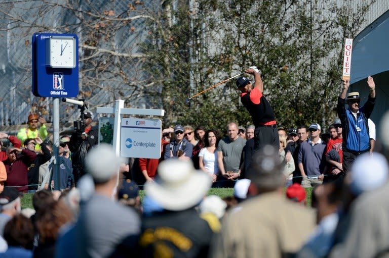 Tiger Woods hits off the 10th tee during the final round at the Farmers Insurance Open at Torrey Pines on January 28, 2013. The world number two won by four strokes to capture his 75th career title