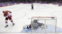 USA goaltender Jonathan Quick stops the last shot by Russia forward Ilya Kovalchuk in a shootout in the men's ice hockey game at the 2014 Winter Olympics, Saturday, Feb. 15, 2014, in Sochi, Russia. (AP Photo/Mark Humphrey )