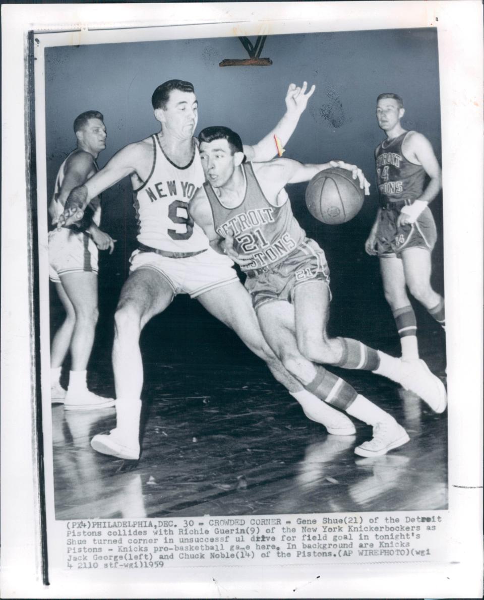 Gene Shue of the Detroit Pistons dribbles Dec. 30, 1959 near Richie Guerin (9) of the New York Knickerbockers. In background are the Knicks' Jack George and Pistons' Chuck Noble.