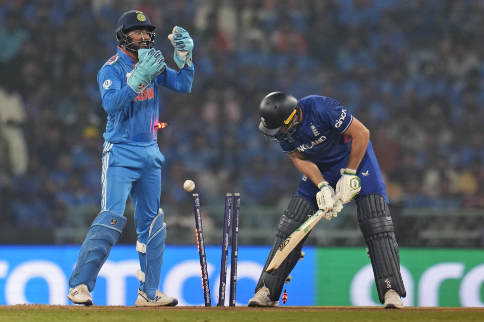 England's captain Jos Buttler is bowled out by India's Kuldeep Yadav during the ICC Men's Cricket World Cup match between England and India in Lucknow, India, Sunday, Oct. 29, 2023. (AP Photo/Aijaz Rahi)