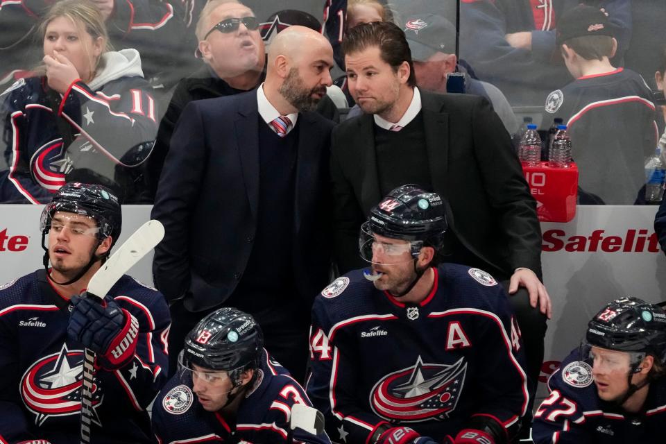 Jan 15, 2024; Columbus, Ohio, USA; Columbus Blue Jackets head coach Pascal Vincent talks to assistant Steve McCarthy during the second period of the NHL hockey game against the Vancouver Canucks at Nationwide Arena.