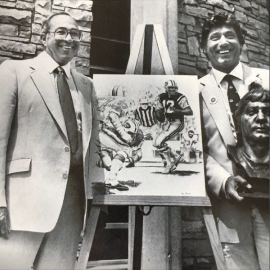 Joe Namath smiles with his high school football coach and Beaver Falls legend Larry Bruno after being enshrined in the Pro Football Hall of Fame in Canton, Ohio in 1985.