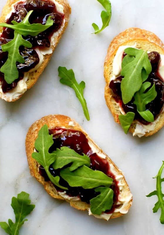 <p>Pinch and Swirl</p><p>This elegant appetizer is actually made with everyday ingredients.</p><p><strong>Get the recipe: <a href="https://pinchandswirl.com/brie-crostini-with-cherries-and-arugula/" rel="nofollow noopener" target="_blank" data-ylk="slk:Brie Crostini With Cherries and Arugula;elm:context_link;itc:0;sec:content-canvas" class="link ">Brie Crostini With Cherries and Arugula</a></strong></p>