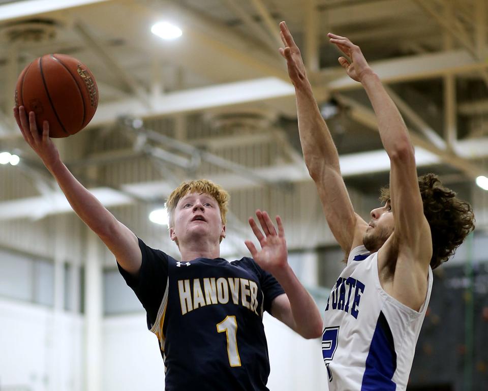 Hanover's James Ritchie glides to the basket to cut Scituate’s lead to 64-55 during fourth quarter action of their game against Scituate at Scituate High on Tuesday, Jan. 10, 2023. 