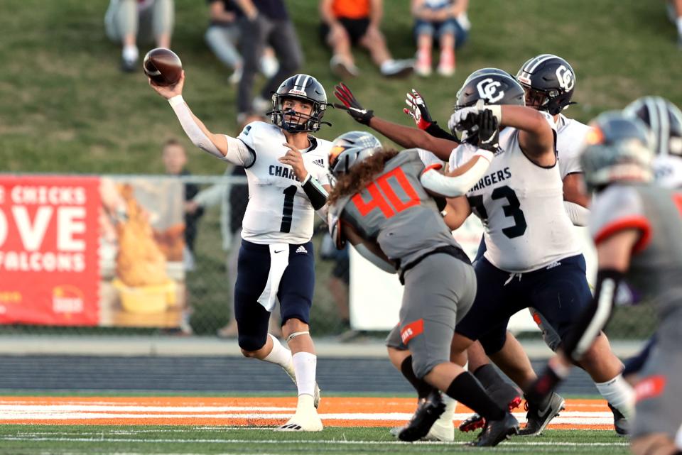 Corner Canyon’s Isaac Wilson, passes the ball as Skyridge and Corner Canyon play a football game in Lehi on Friday, Sept. 23, 2022. Corner Canyon won 21-17. | Scott G Winterton, Deseret News