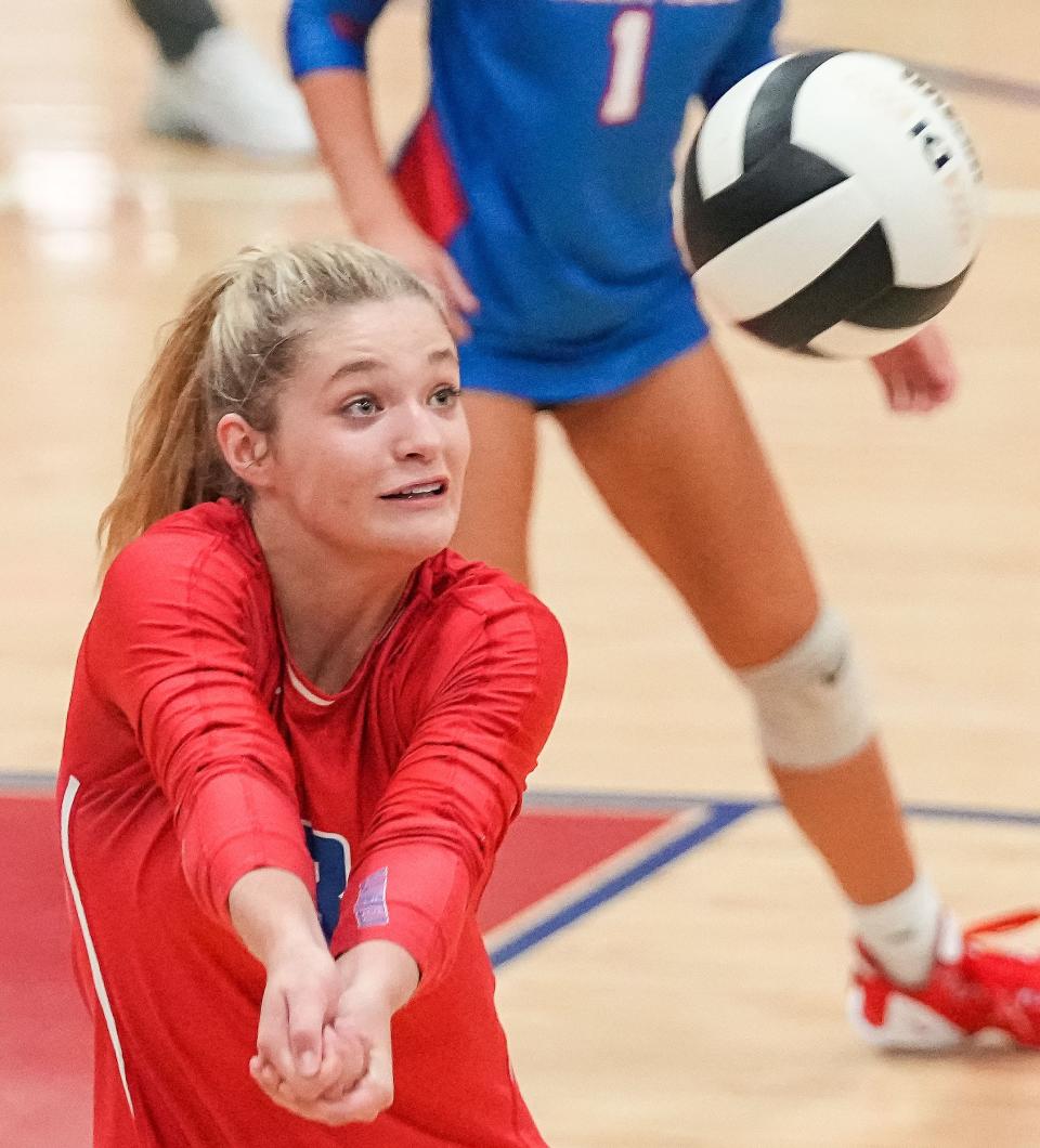 Plainfield Quakers Ava Utterback (3) sets the ball on Tuesday, August 23, 2022 at Martinsville High School in Martinsville. Plainfield Quakers defeated the Martinsville Artesian in 3-1.