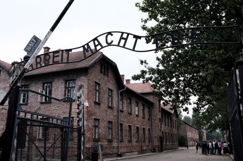 The gate reading in German "Arbeit Macht Frei" meaning, "Work Makes You Free" is seen near the entrance to the former German Nazi Concentration Camp Auschwitz I in Oswiecim, Poland. On January 27, 1945, the Soviet army liberated the Auschwitz network of concentration camps in Poland, freeing some 7,000 survivors. File Photo by Debbie Hill/UPI