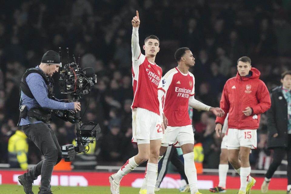 Arsenal's Kai Havertz, centre, celebrates with teammates after the English Premier League soccer match between Arsenal and Brentford at the Emirates Stadium in London, England, Saturday, March 9, 2024. (AP Photo/Frank Augstein)