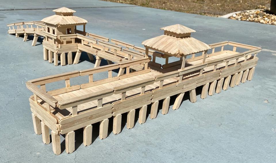 Danny Berton estimates it took him 100 hours to build his replica of the Fort Myers Beach Pier with popsicle sticks.