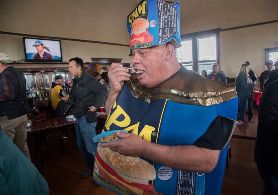 Self-proclaimed "Spam King" Paul Steele takes a test of Spam fired rice at the 21st annual Spam Festival at Peter's Steakhouse in the Delta town of Isleton on Feb 17, 2019. In addition to a cookoff, there were Spam throwing and Spam eating contests. The contest began in 1997 when the tiny Delta town flooded, leaving only cans of Spam to cook. 