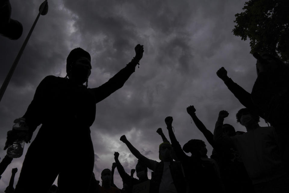 People demonstrate in Lyon, central France, Saturday, June 6, 2020, to protest against the recent killing of George Floyd by police officers in Minneapolis, USA, that has led to protests in many countries and across the US. (AP Photo/Laurent Cipriani)