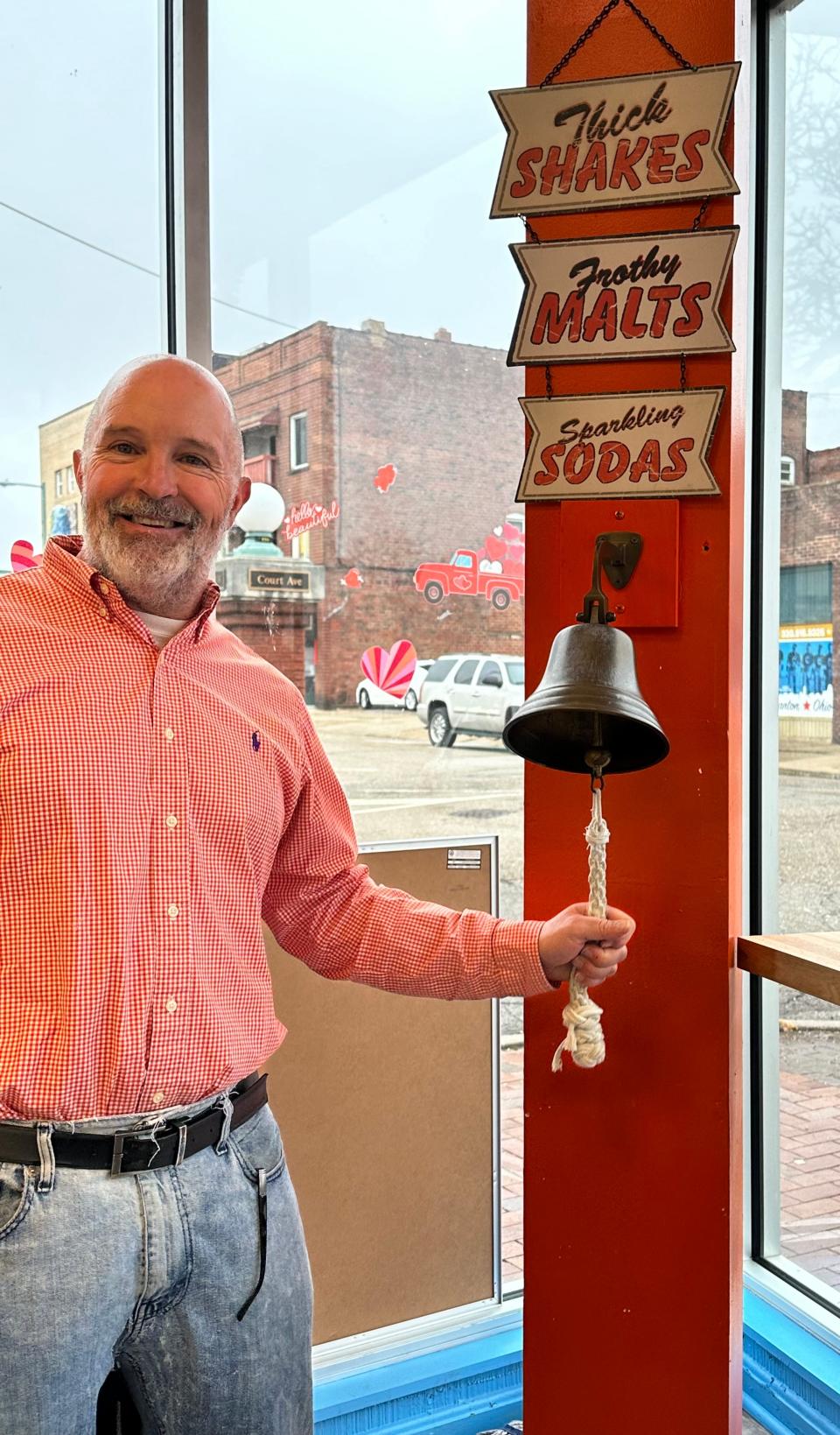 2 Scoopz owner David Beck invites you to ring the bell when you purchase two scoops of your favorite, or soon to be favorite, ice cream flavors.