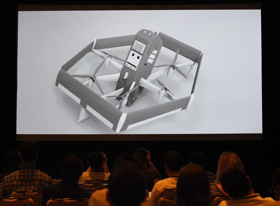 The new Amazon delivery drone is displayed on a screen during the Amazon Re:MARS conference on robotics and artificial intelligence in Las Vegas, Nevada, on June 5, 2019. (Photo by Mark RALSTON / AFP)        (Photo credit should read MARK RALSTON/AFP/Getty Images)