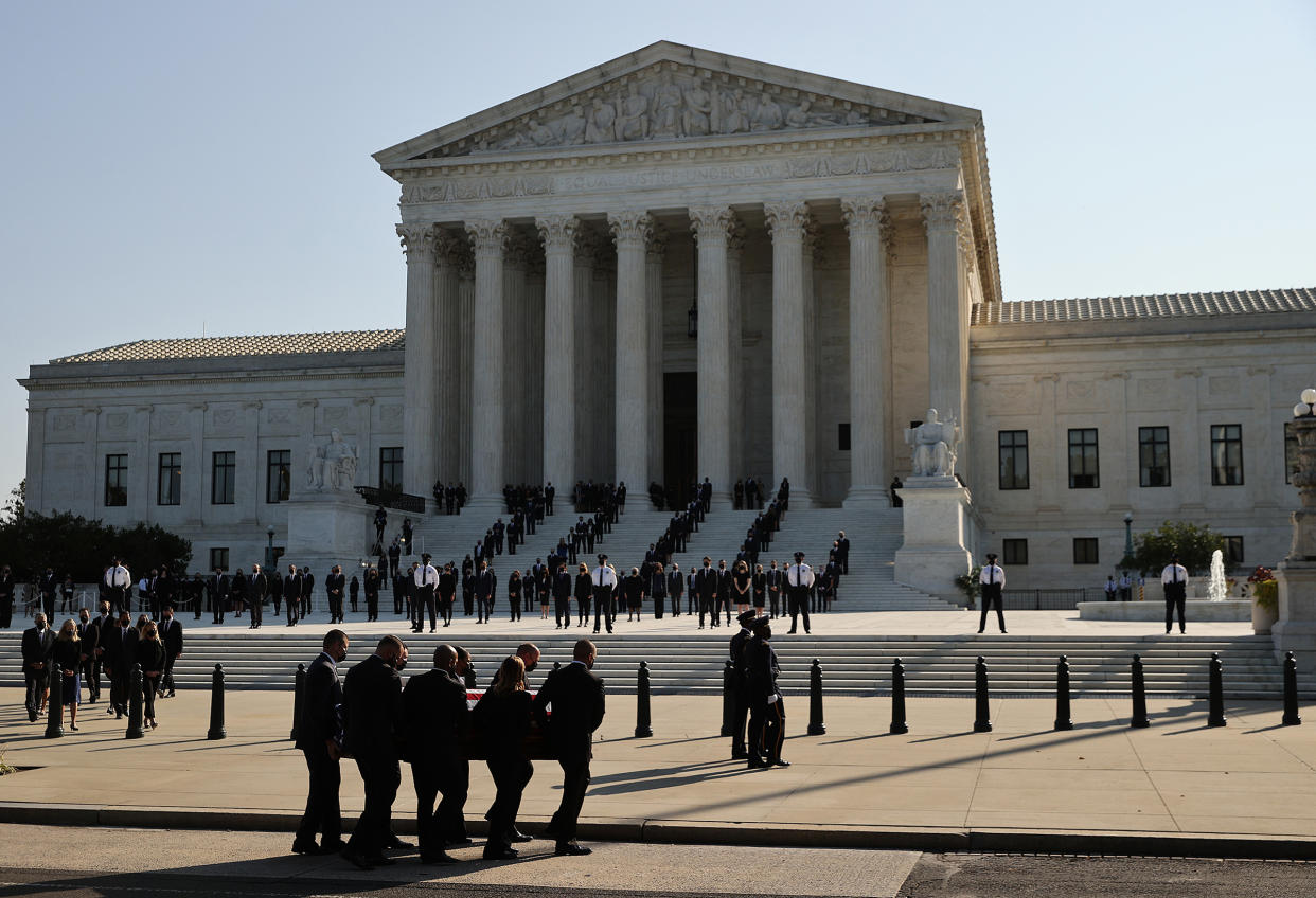 The casket containing the remains of Associate Justice Ruth Bader Ginsburg is carried at the U.S. Supreme Court where she will lie in repose, on Sept. 23