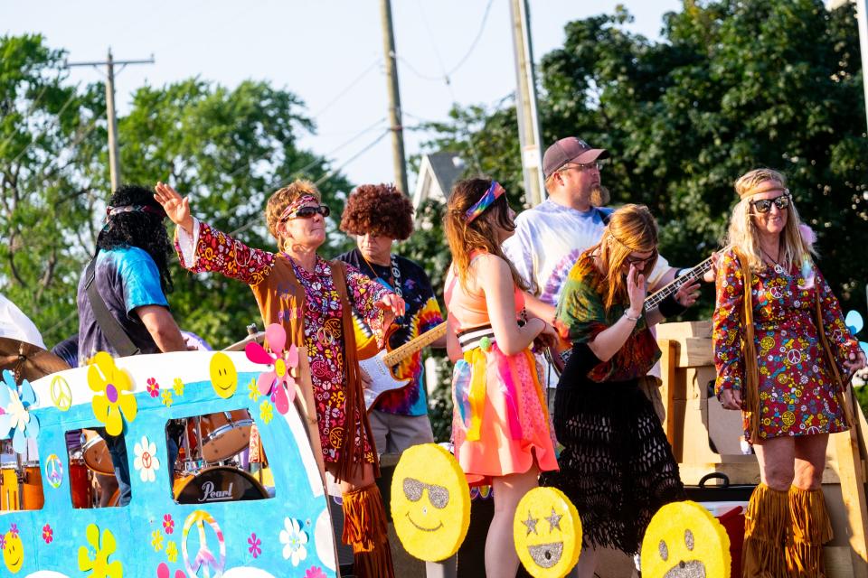 Floats are driven down Huron Avenue during the Rotary International Day Parade during Boat Week Wednesday, July 21, 2021, in Port Huron.