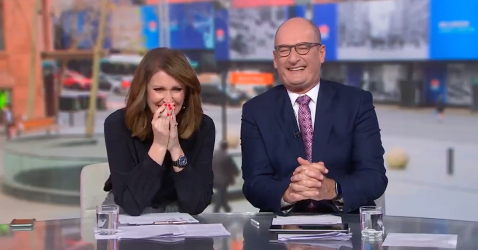 Sunrise's Nat Barr and Kochie laughing.